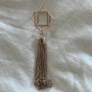 Long necklace.  Rose gold color